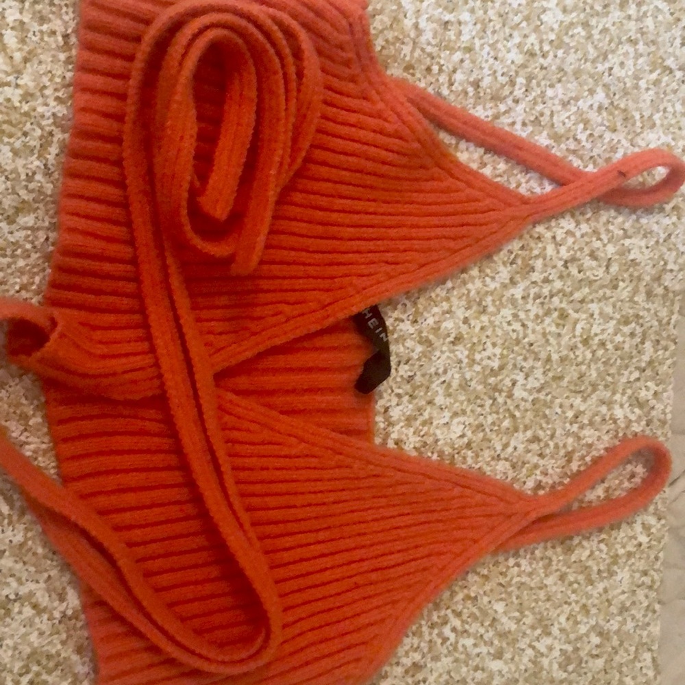 I am selling a orange in front tie up croptop,it is from shein.